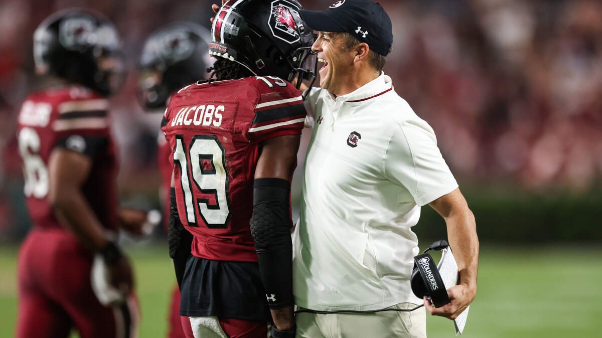 South Carolina wide receiver Vandrevius Jacobs (19) celebrates with head coach Shane Beamer after scoring a touchdown during the Gamecocks’ game against South Carolina State at Williams-Brice Stadium in Columbia on Saturday, September 6, 2025.