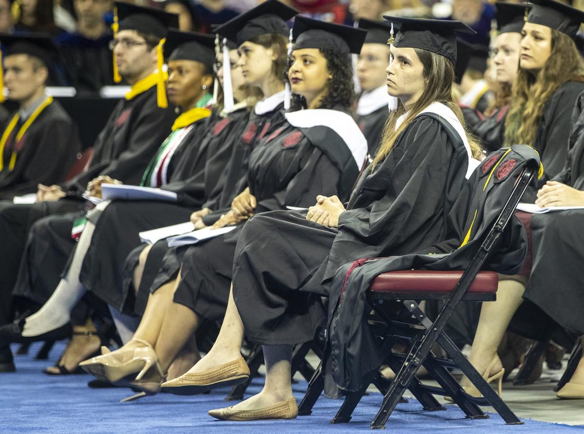 A chair is left empty with a gown draped over it to honor Samantha Josephson during USC’s commencement ceremony at Colonial Life Arena Saturday May 11, 2019, in Columbia, SC.