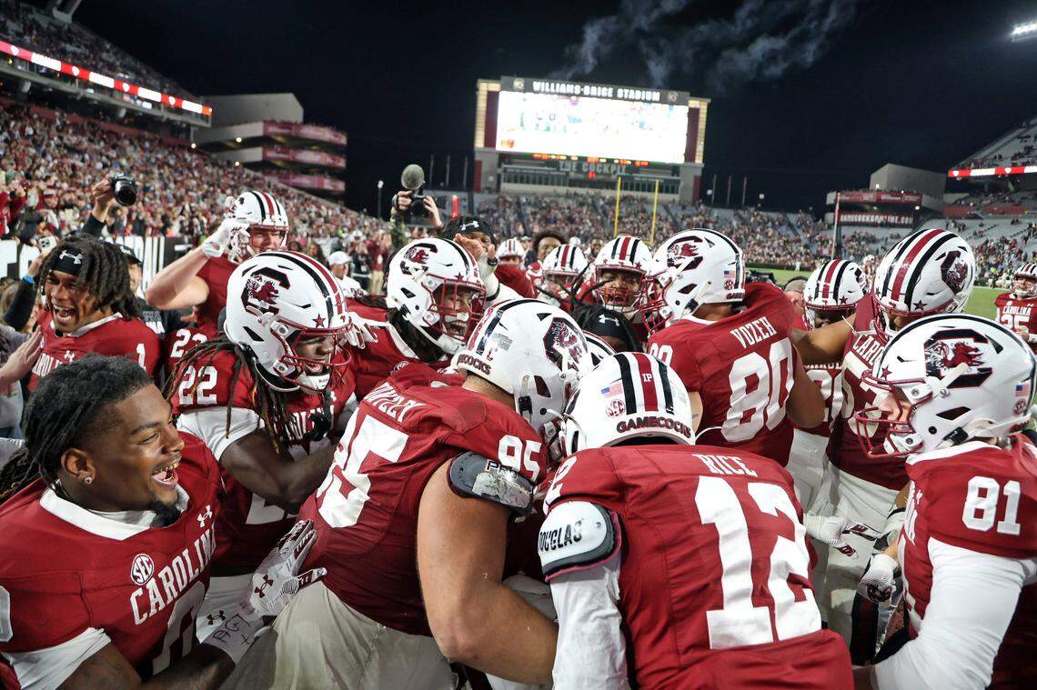 Teammates mob South Carolina running back Bradley Dunn after he scored a touchdown Saturday against Wofford in the game’s final moments at Williams-Brice Stadium.