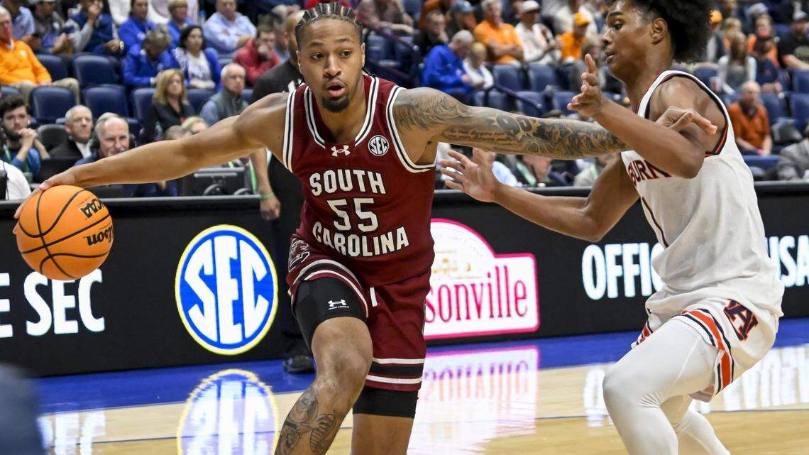 South Carolina Gamecocks guard Ta’Lon Cooper (55) drives baseline against the Auburn Tigers during the first half at Bridgestone Arena.