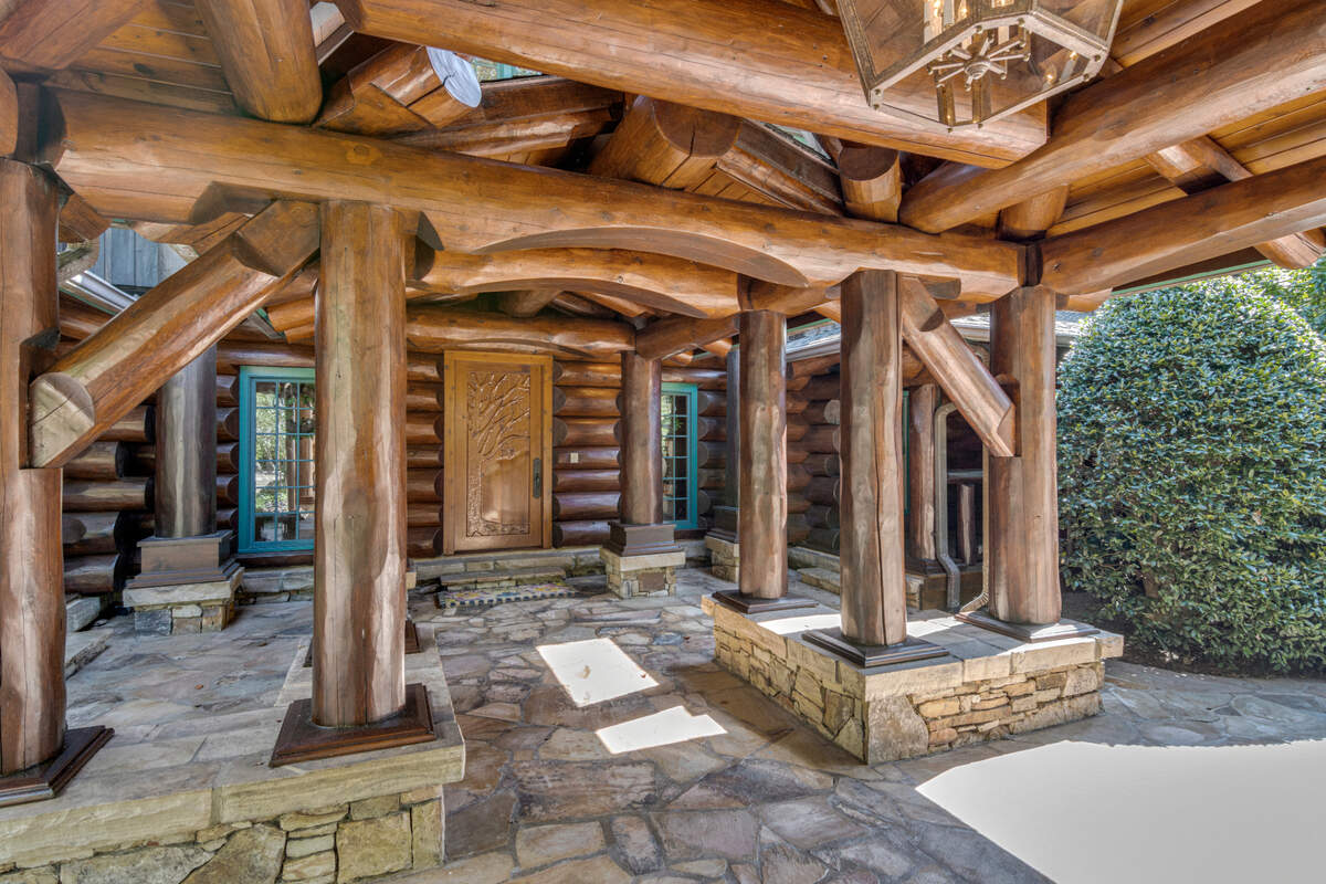 The front entrance to a $4.9 million log home for sale in South Carolina