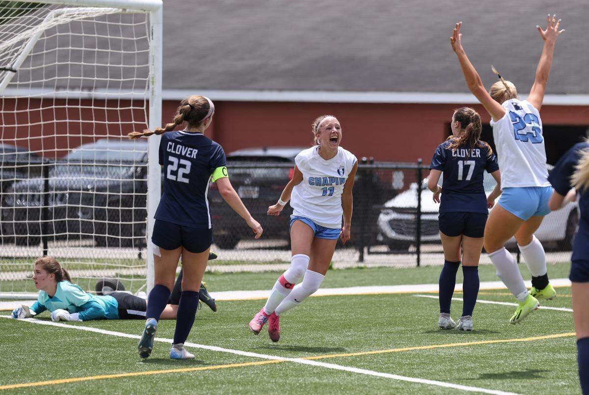 Darcy Ahern (11) celebrates after scoring a goal against Clover during the first half of the SCHSL Class 5A Girls Soccer State Final at Memorial Stadium in Columbia on Friday, May 10, 2024.