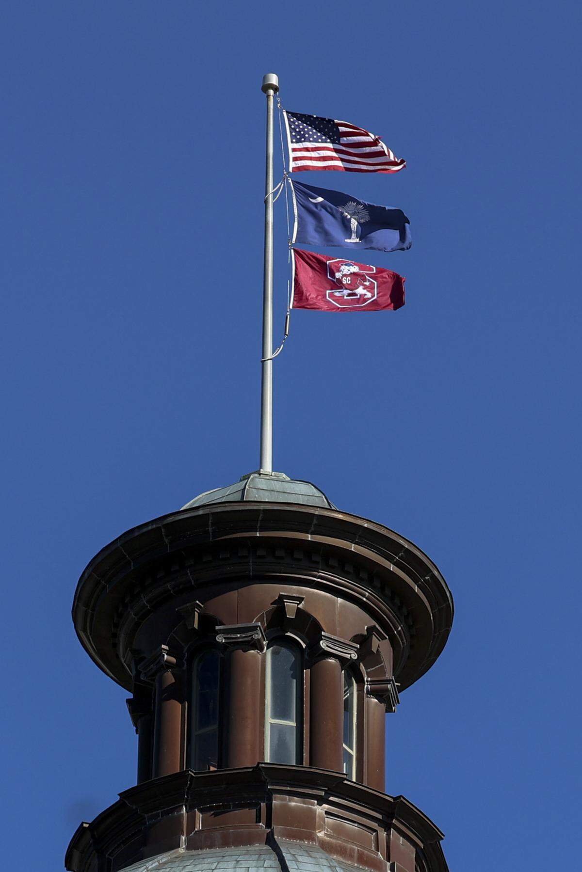 The South Carolina State University flag flies on the State House dome on Monday, Jan. 19, 2026. The football team won the 2025 HBCU National Championship.