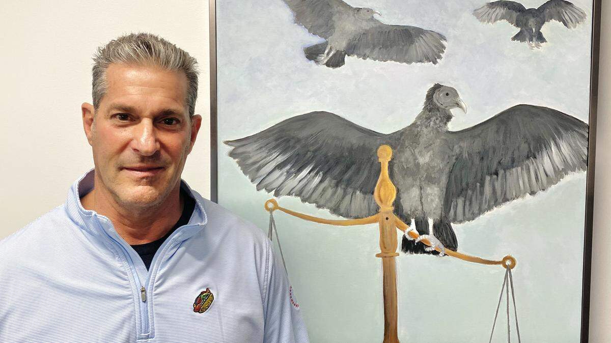 Eric Bland, who was called a “vulture” by a rival lawyer, has turned the slight into a badge of honor and has a vulture painting and statue in his office.