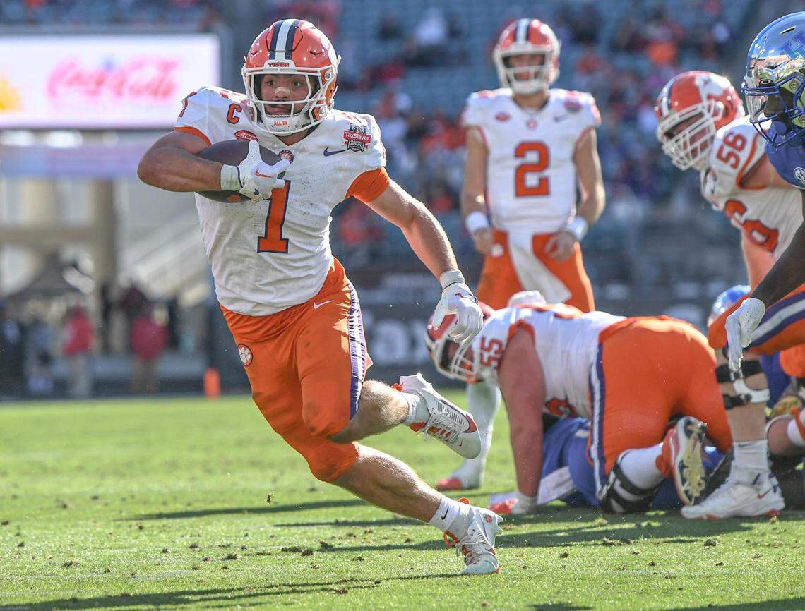 Clemson running back Will Shipley (1) runs during the fourth quarter of the TaxSlayer Gator Bowl at EverBank Stadium in Jacksonville, Florida, Friday, December 29, 2023. Clemson won 38-35.
