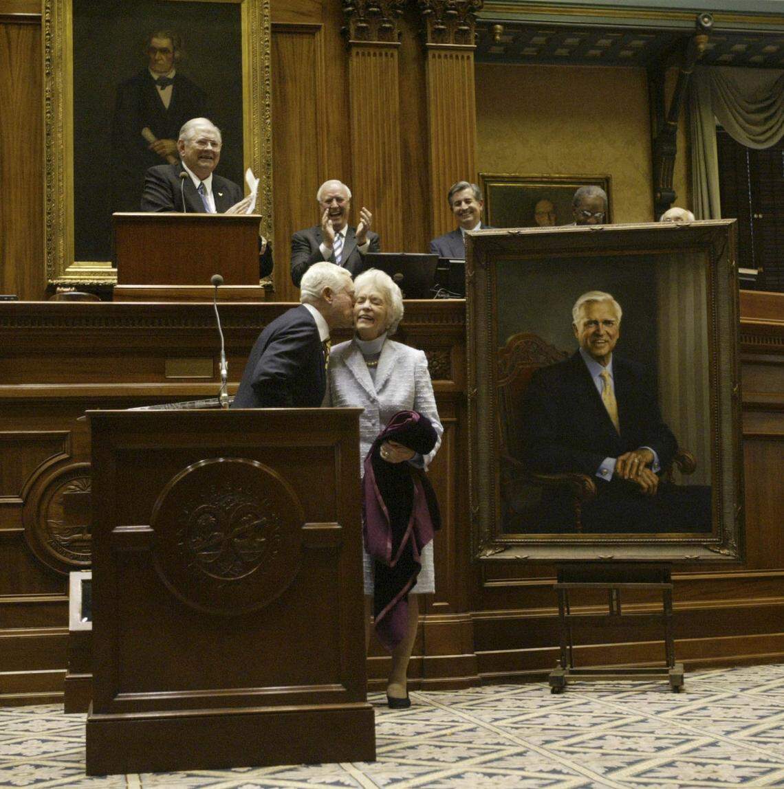 2/16/05 Columbia, SC -- Peatsy Hollings, wife of US Senator Fritz Hollings, gets a kiss from her husband after unveiling his portrait during a ceremony in the Senate Chambers Wednesday afternoon. Photo by Todd Bennett