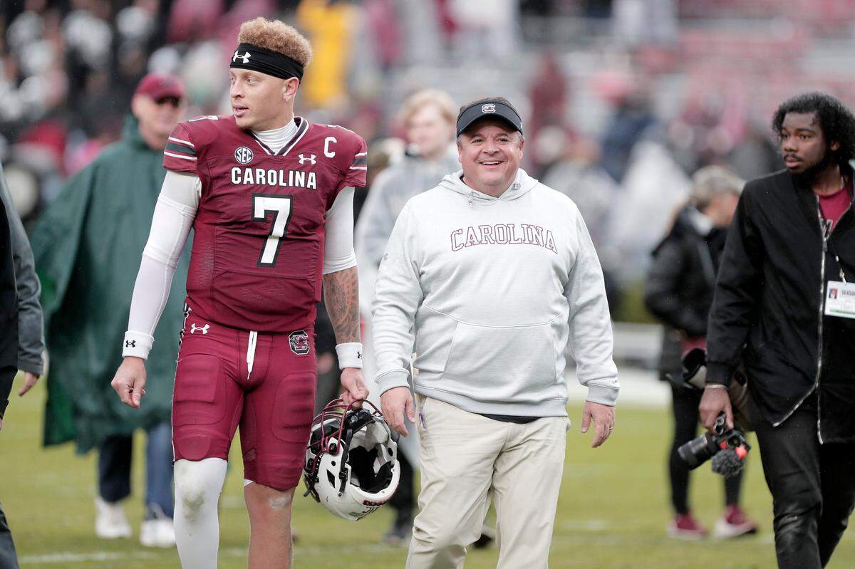 South Carolina’s Spencer Rattler and Dowell Loggains after the game against Vanderbilt on Saturday, Nov. 11, 2023 at Williams-Brice Stadium.