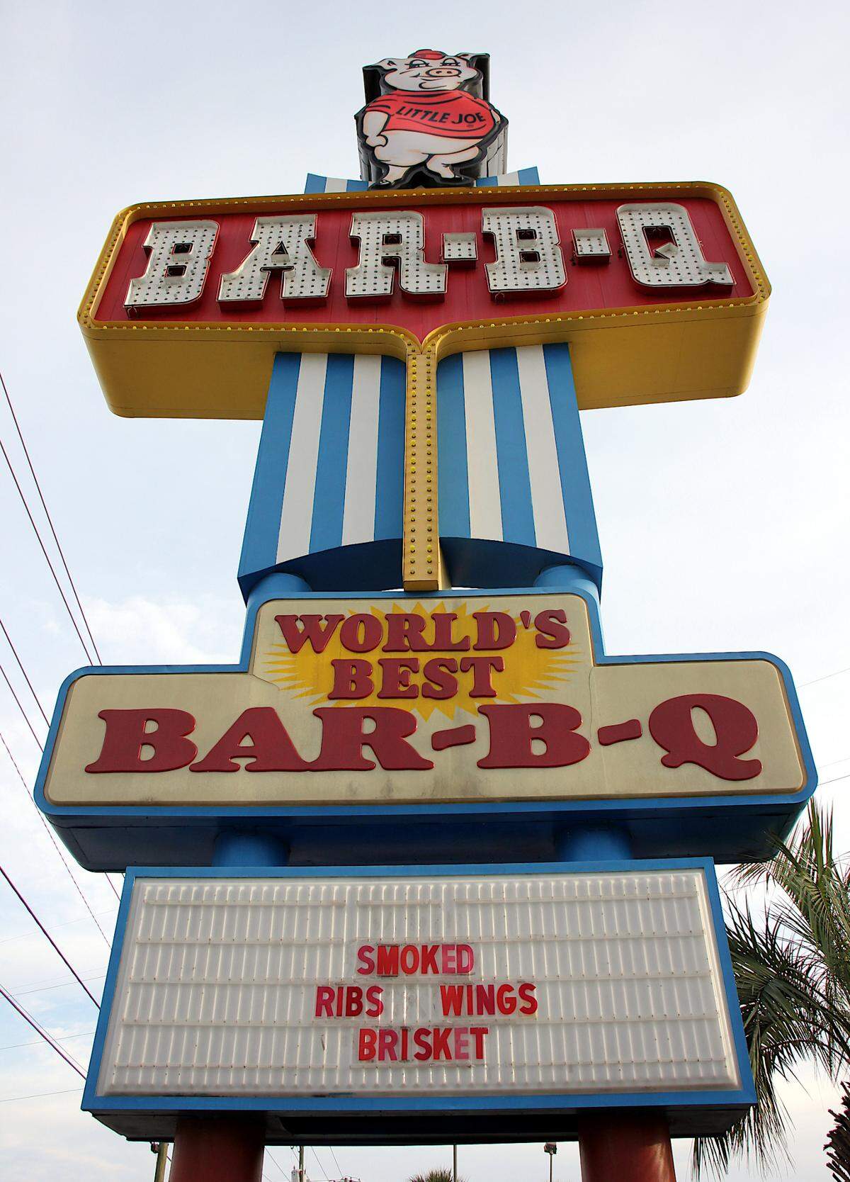 The sign at the West Columbia mothership of Maurice’s Piggie Park BBQ looms tall. Oct. 11, 2023