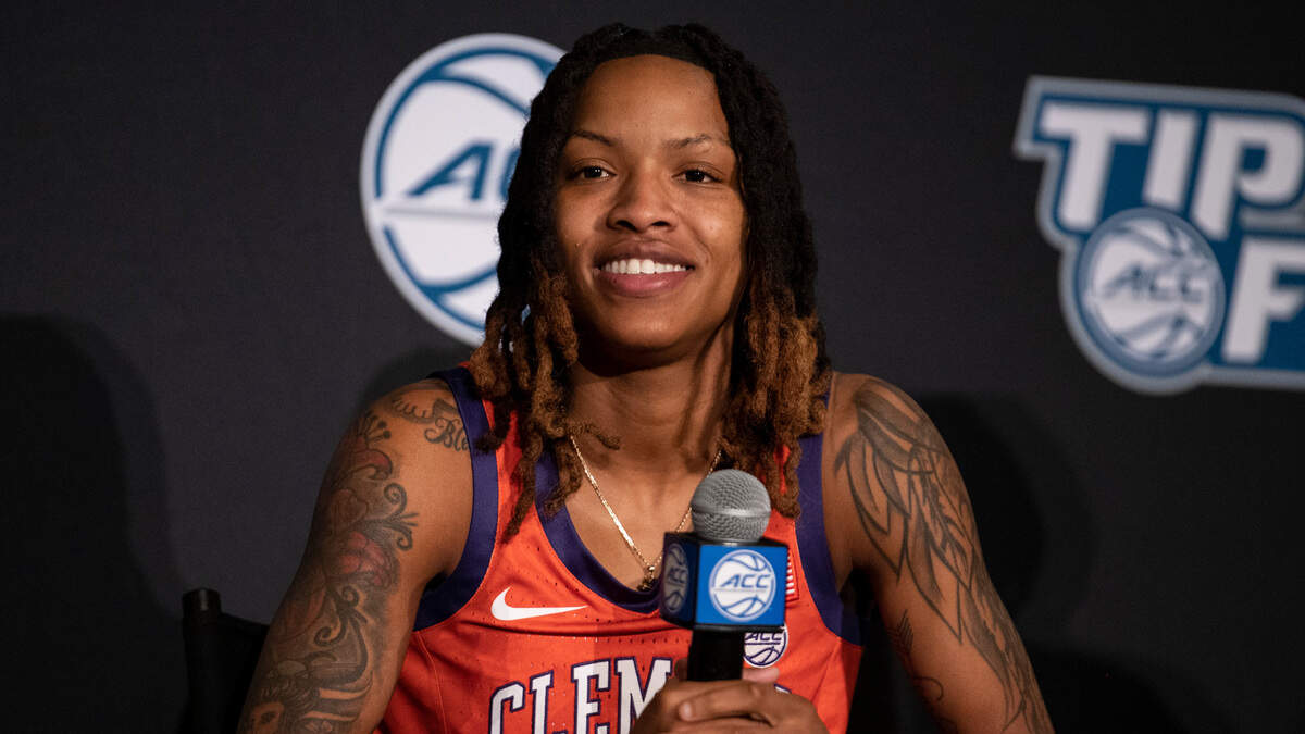 Clemson guard Delicia Washington smiles during NCAA college basketball Atlantic Coast Conference media day Oct. 13, 2021 in Charlotte.