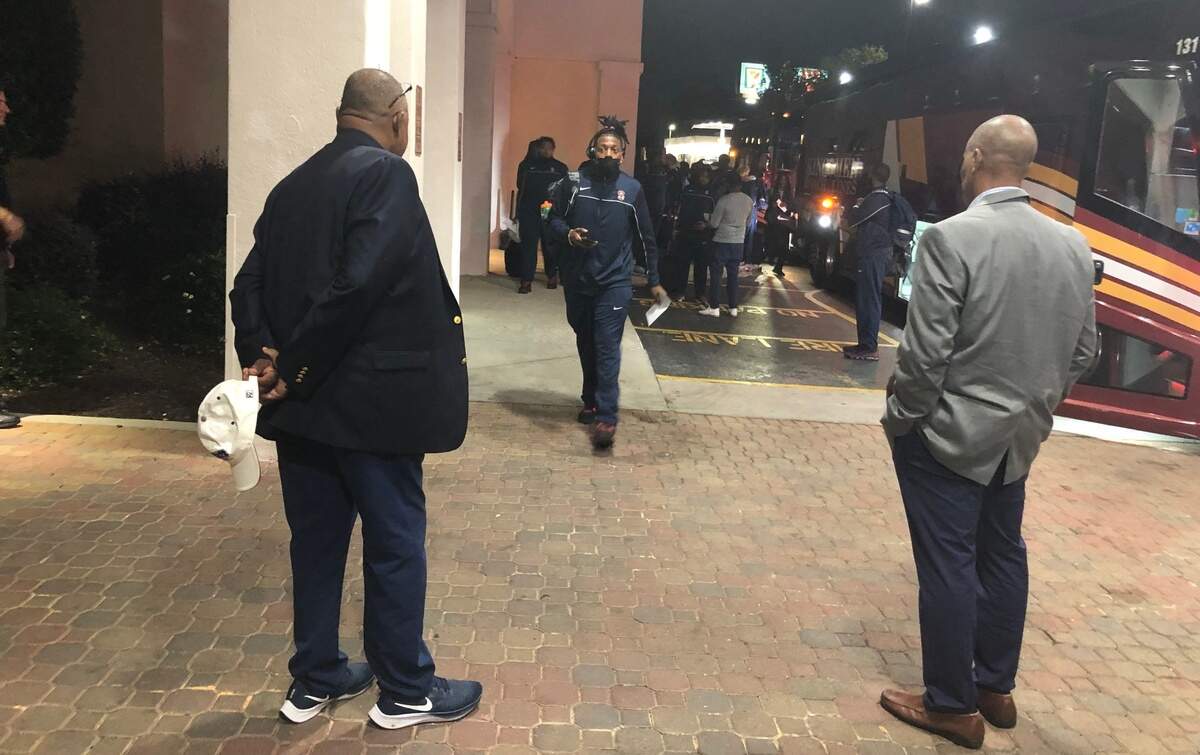 The S.C. State football team arrives Wednesday night at the Embassy Suites in Columbia. Head coach Buddy Pough and play-by-play announcer Ernest Robinson greet the team just outside the hotel door.