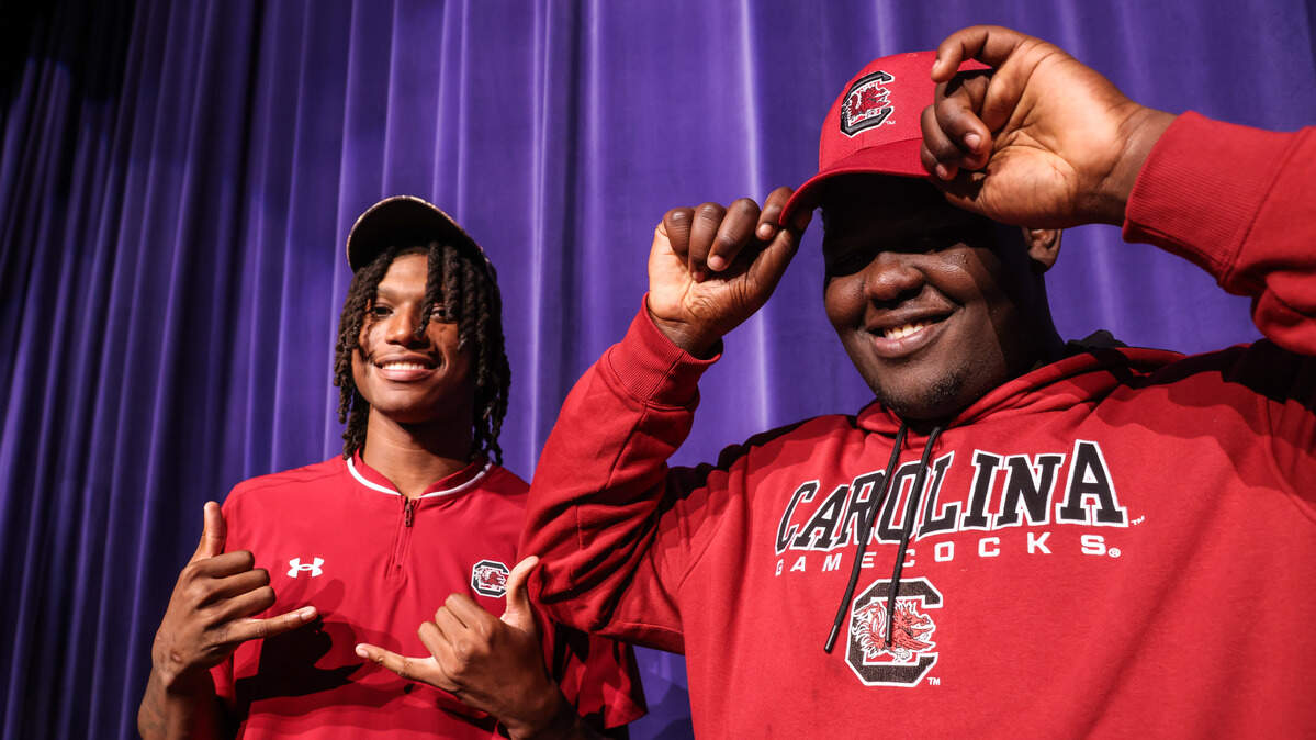 J’Zavien Currence and Anthony Baxter are seen during the National Signing Day ceremony at South Pointe High School in Rock Hill on Wednesday, December 3, 2025.
