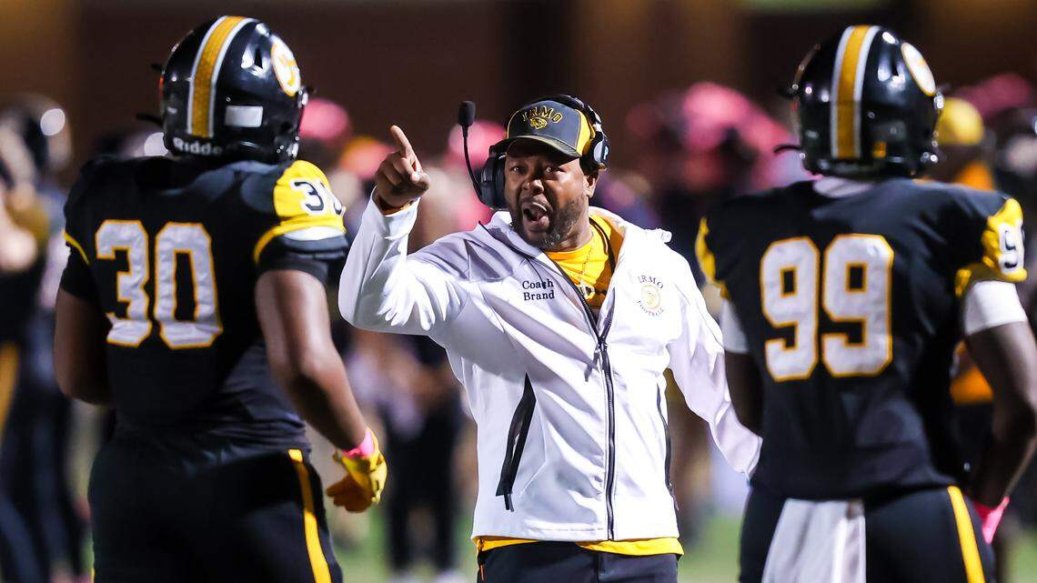 Irmo Yellow Jackets head coach Aaron Brand directs his team during the game between the White Knoll Timberwolves at the Irmo Yellow Jackets, Friday night, 10/17/25.