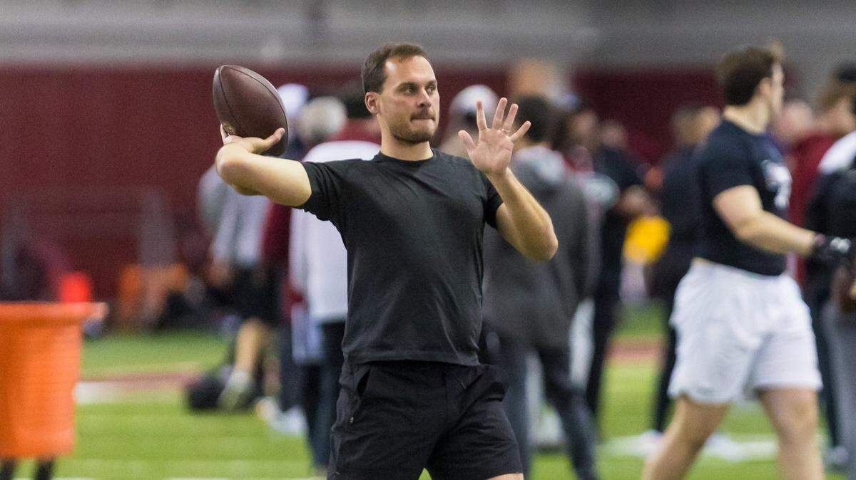 Former South Carolina Gamecocks quarterback Perry Orth throws for prospects during USC Pro Day March 13, 2023.