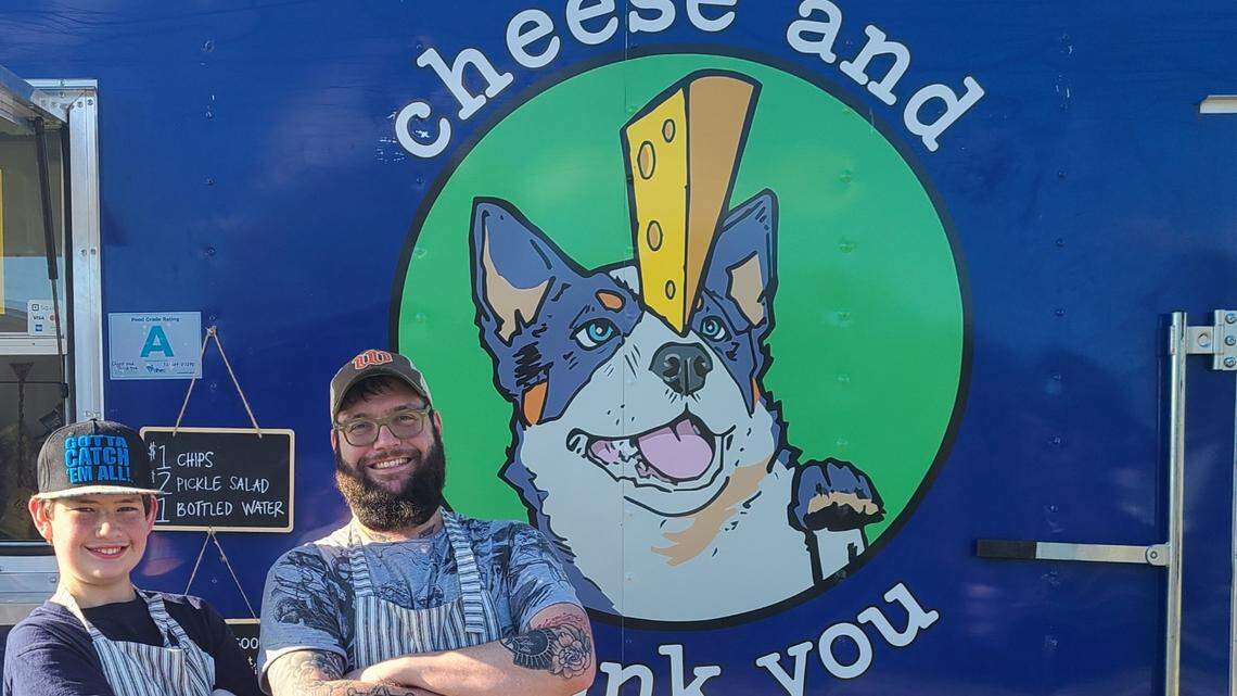 Cheese and Thank You owner and chef Austin Benz stands beside his son and co-worker, Cordell Benz. The food truck makes specialty grilled cheeses.