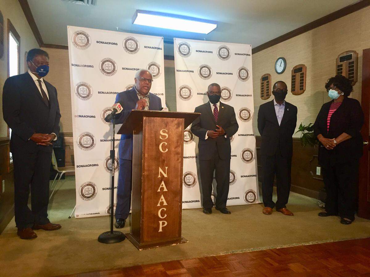 Donald Gist, a Columbia civil rights attorney, speaks at a press conference regarding the closure of Walgreens on North Main Street. He is joined, from left, by Columbia Urban League President J.T. McLawhorn, state Sen. John Scott, City Councilman Sam Davis, and S.C. NAACP President Brenda Murphy.