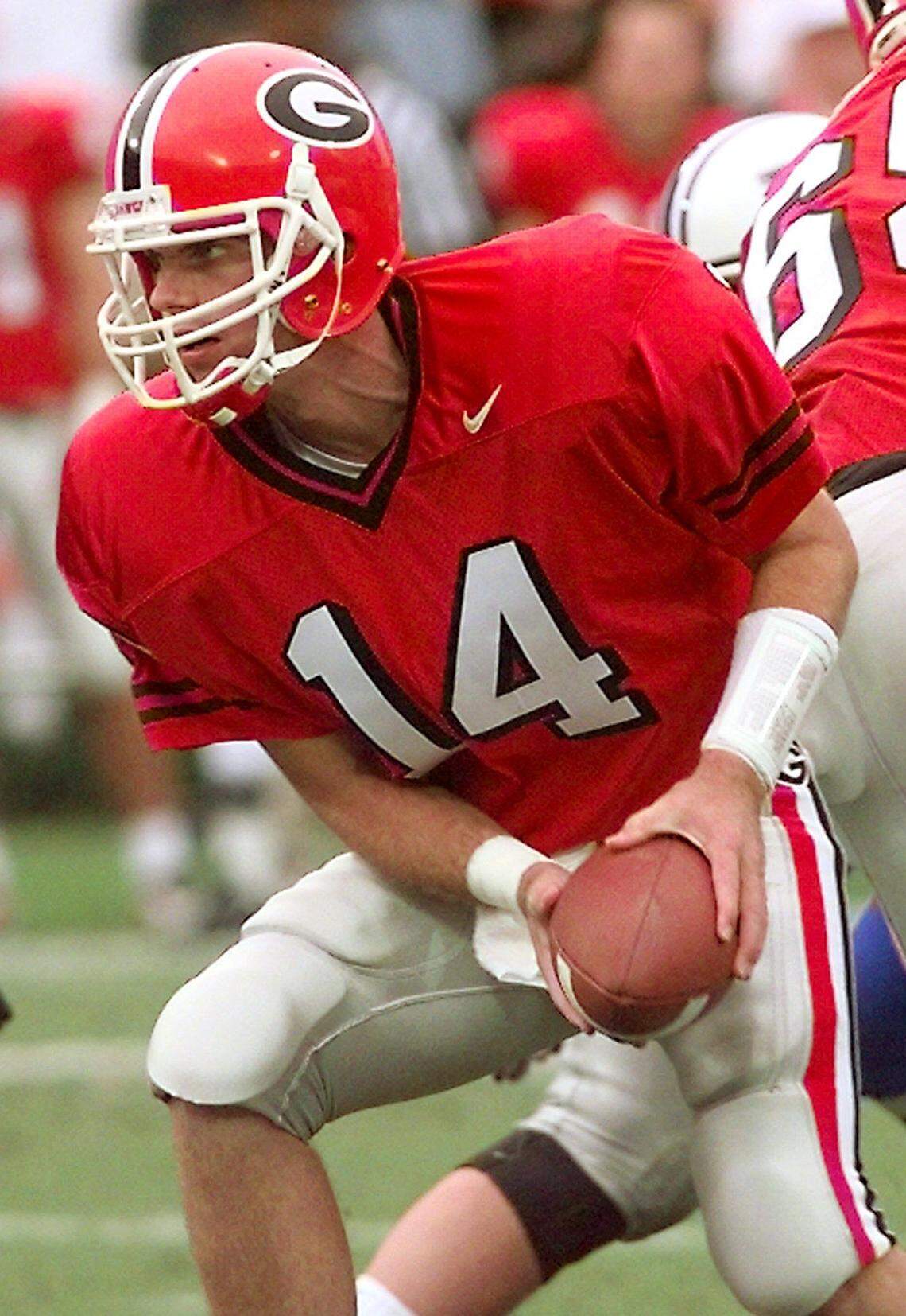 Georgia quarterback Mike Bobo (14) looks to hand off during first half play against Kentucky in Athens, Ga., Saturday, Oct. 25, 1997. (AP Photo/Wilford Harewood)