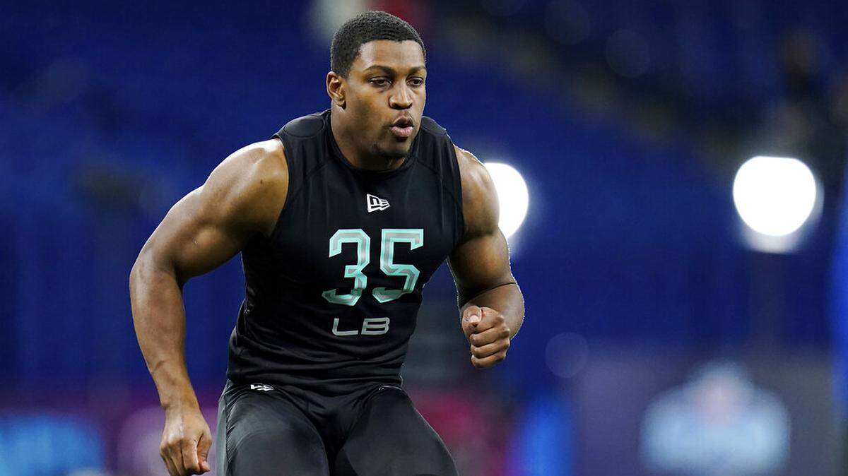 Georgia linebacker Channing Tindall (35) participates in a drill at the NFL football scouting combine in Indianapolis, Saturday, March 5, 2022.
