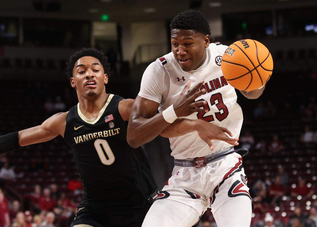 South Carolina Gamecocks forward Gregory “GG” Jackson II (23) gets fouled by Vanderbilt Commodores guard Tyrin Lawrence (0) during South Carolina’s game against visiting Vanderbilt at Colonial Life Arena in Columbia on Tuesday, February 14, 2023.