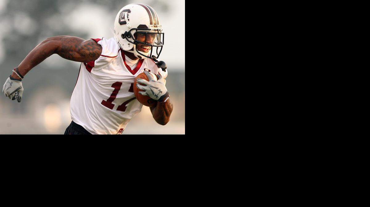 USC's Chris Culliver runs through drills during practice after making a reception.