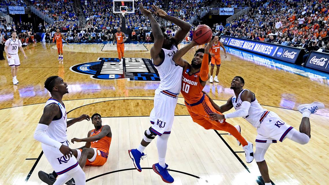 Clemson Tigers guard Gabe DeVoe (10) shoots the ball against Kansas Jayhawks center Udoka Azubuike (35) during the game in the Midwest regional of the 2018 NCAA Tournament at CenturyLink Center.