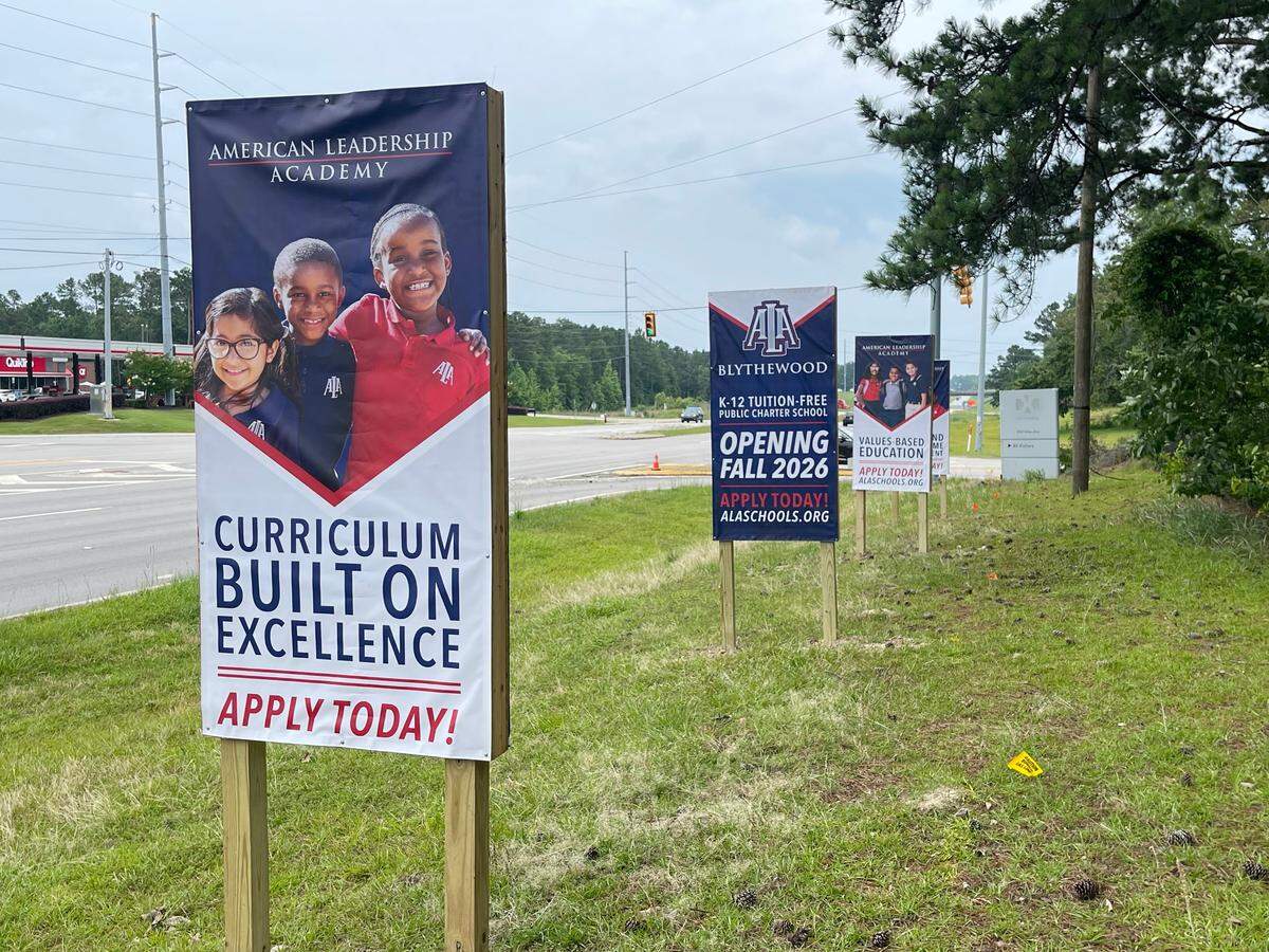 Signs for American Leadership Academy Blythewood posted outside the entrance of the former Policy Management Systems Corp. campus in Blythewood.