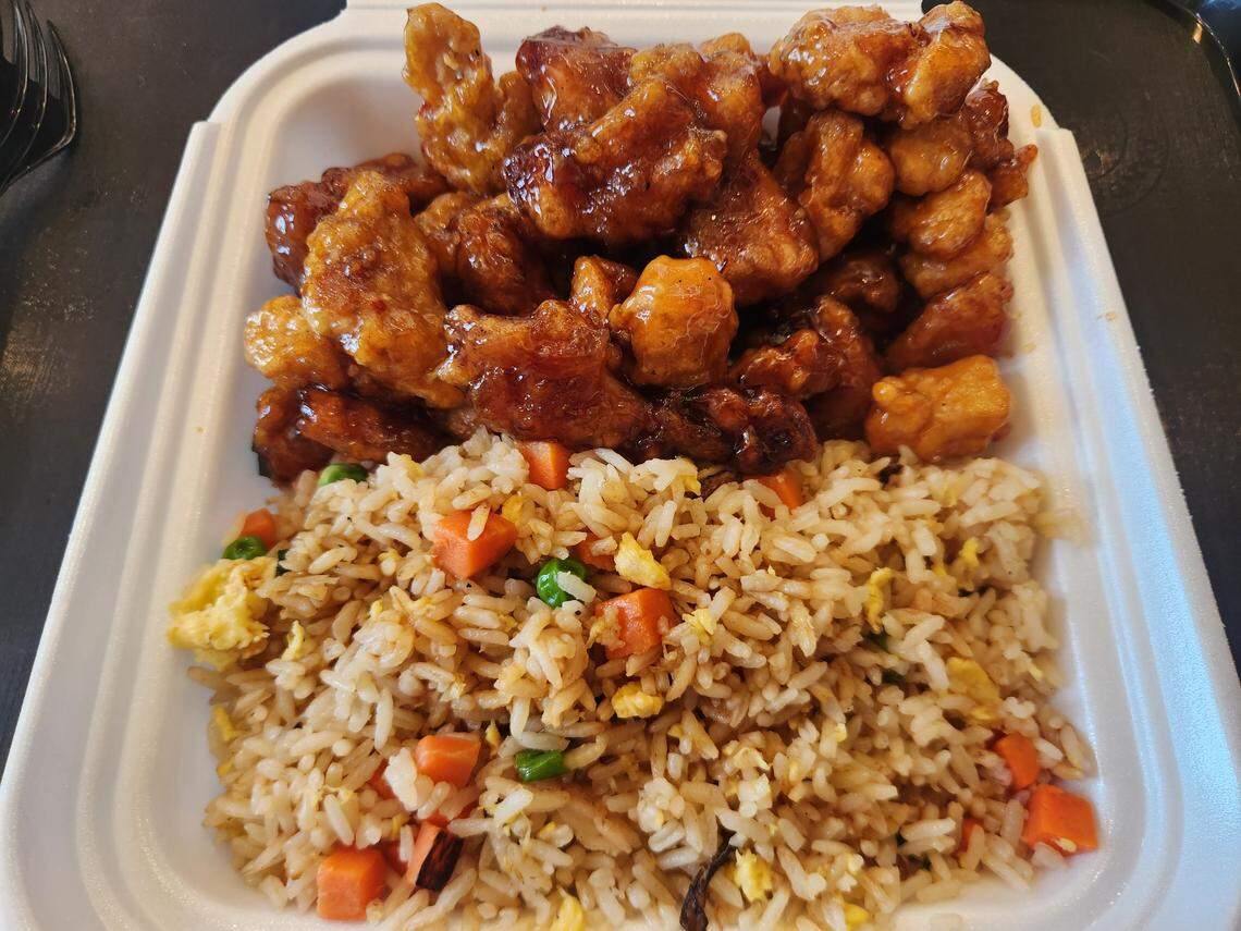 A plate of orange chicken and fried rice at Panda Express near Red Bank.