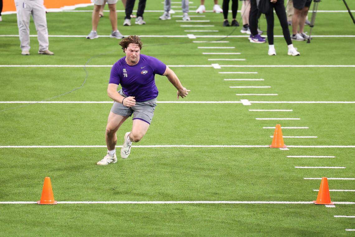 Blake Miller of the Clemson Tigers does the 3-cone shuttle at Pro Day at Allen N. Reeves Football Complex on March 12.