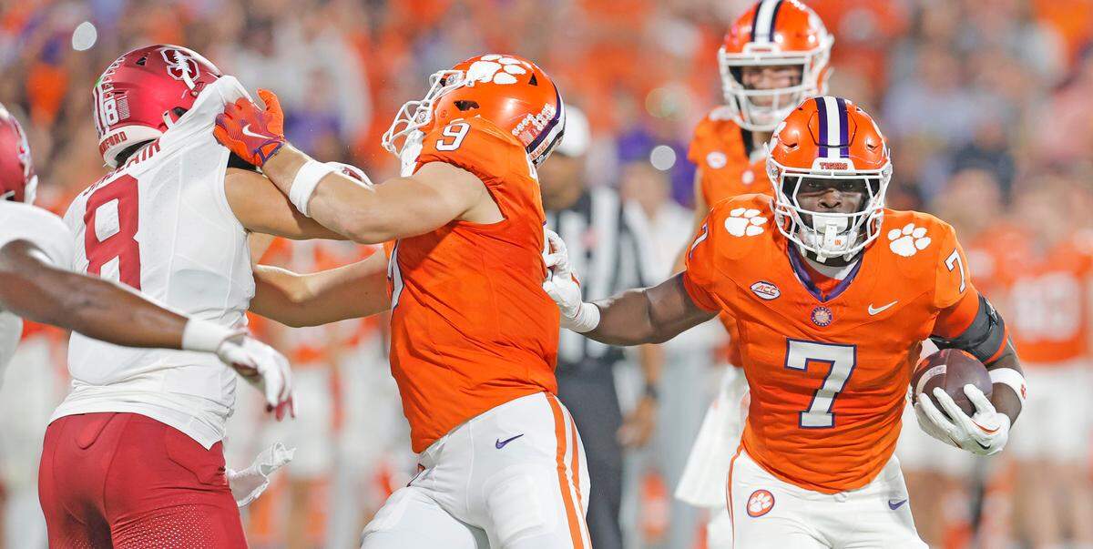 Clemson tight end Jake Briningstool (9) creates space for Clemson running back Phil Mafah (7) against Stanford during first-half action in Clemson, S.C. on Saturday, Sept. 28, 2024.