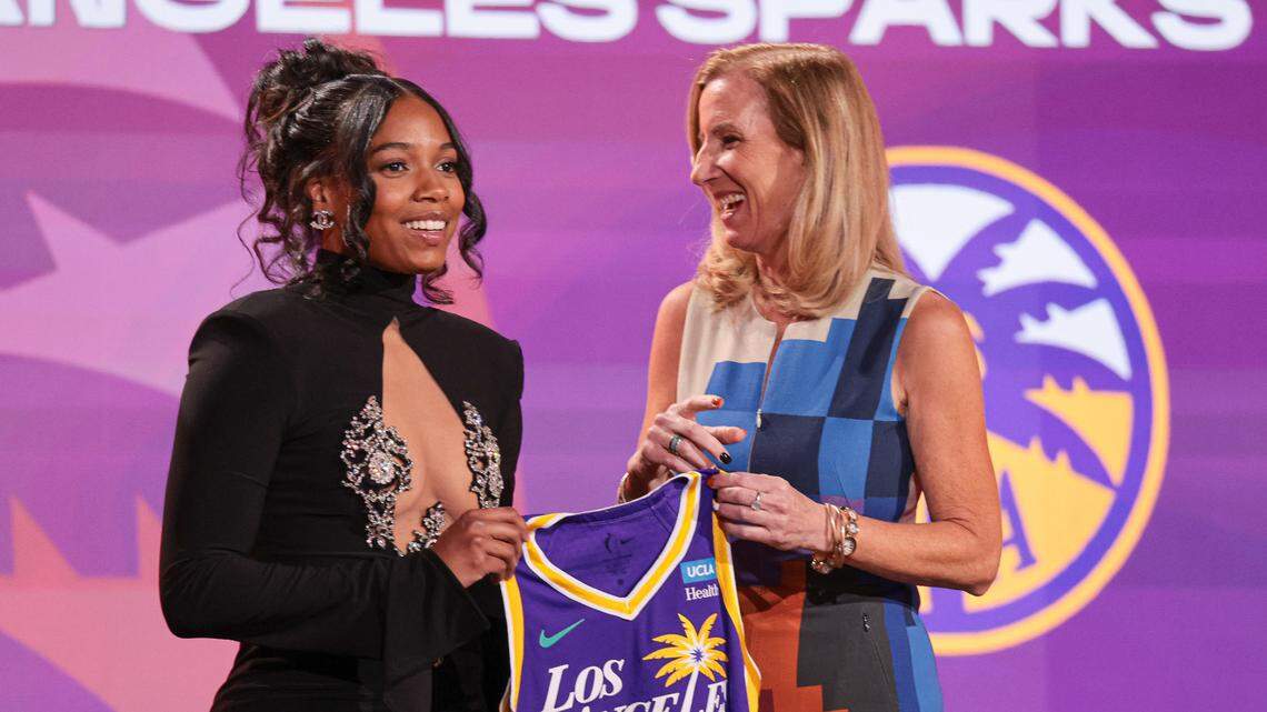 Zia Cooke poses for a photo with WNBA Commissioner Cathy Engelbert after being drafted 10th overall by the Los Angeles Sparks.