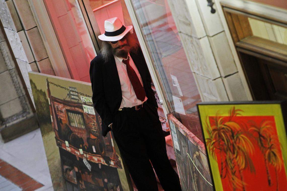 Artist Blue Sky participates in First Thursday inside the Arcade Building in downtown Columbia. First Thursday, the monthly late-night open house for businesses on Columbia’s Main Street has expanded south to Gervais Street and now covers five blocks.