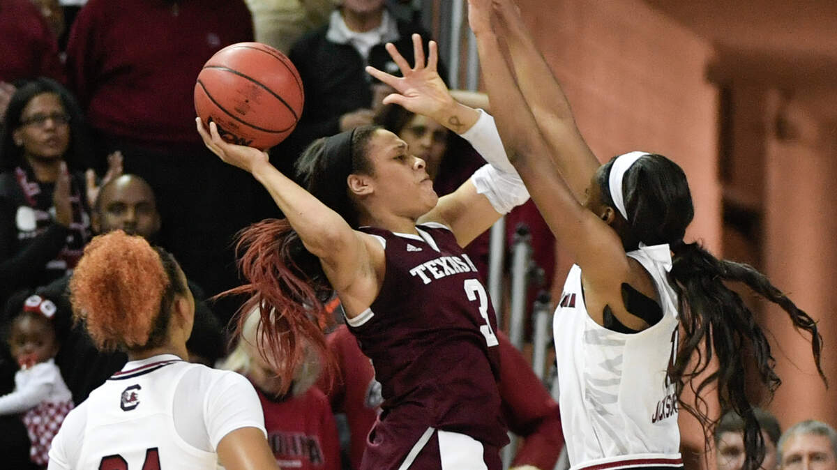 South Carolina’s Bianca Jackson (10) and South Carolina’s Lele Grissett (24) pressure Texas A&M’s Chennedy Carter (3) during the second half of action in the Colonial Life Arena.USC won, 61-59 12/31/17
