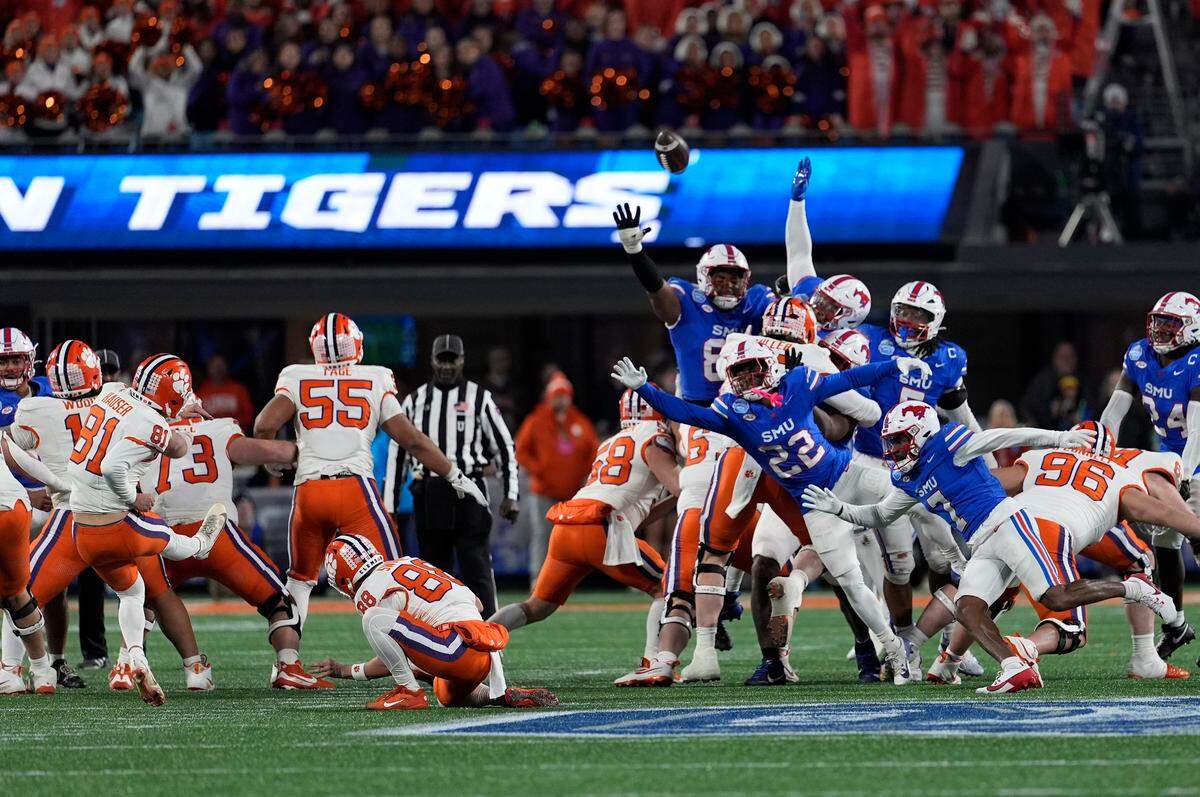Clemson Tigers place kicker Nolan Hauser (81) makes a 56-yard field goal as time expires in the fourth quarter to win the 2024 ACC Championship game against the Southern Methodist Mustangs at Bank of America Stadium.