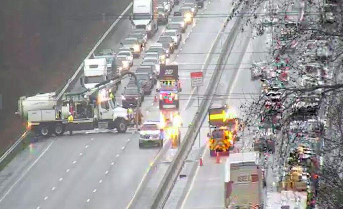 Vehicles were backed up because of flooding on a highway in Columbia.