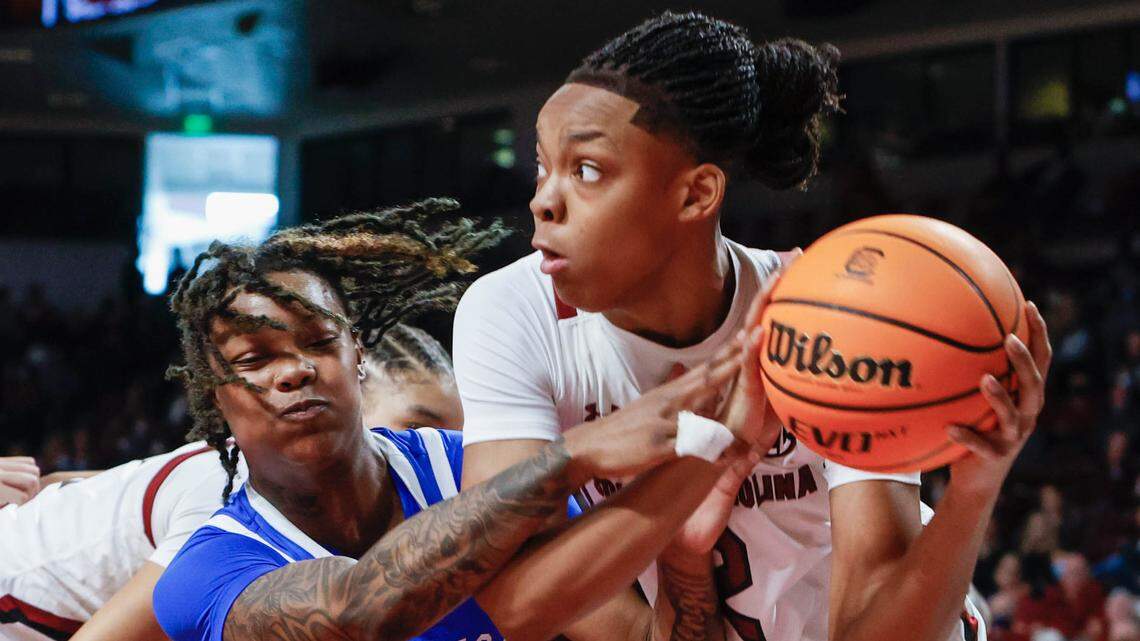 South Carolina’s Eniya Russell (2) is pressured by Kentucky’s Jazmine Massengill (3) during the first half of action on Sunday, Jan. 9, 2022 in the Colonial Life Arena.