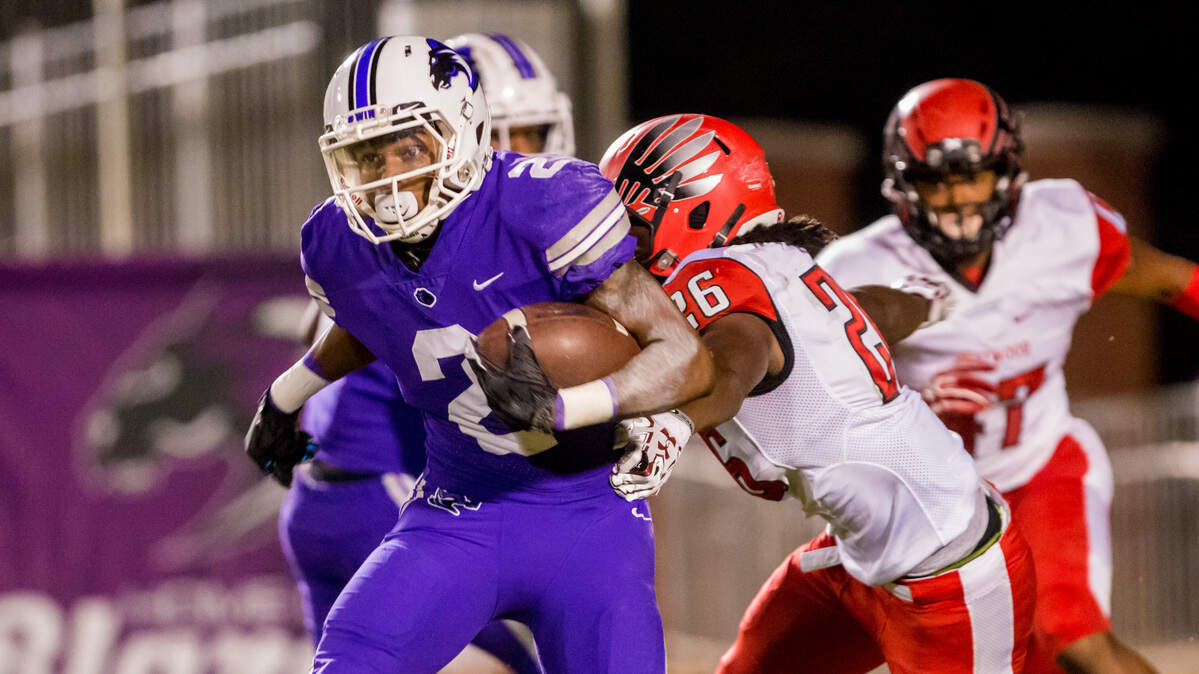 Ridge View Blazers Walyn Napper (2) runs for a big gain past Westwood Redhawks Cj Johnson (26) during the game between Westwood High School and Ridgeview High School at Richland District 2 Stadium in Blythewood.
