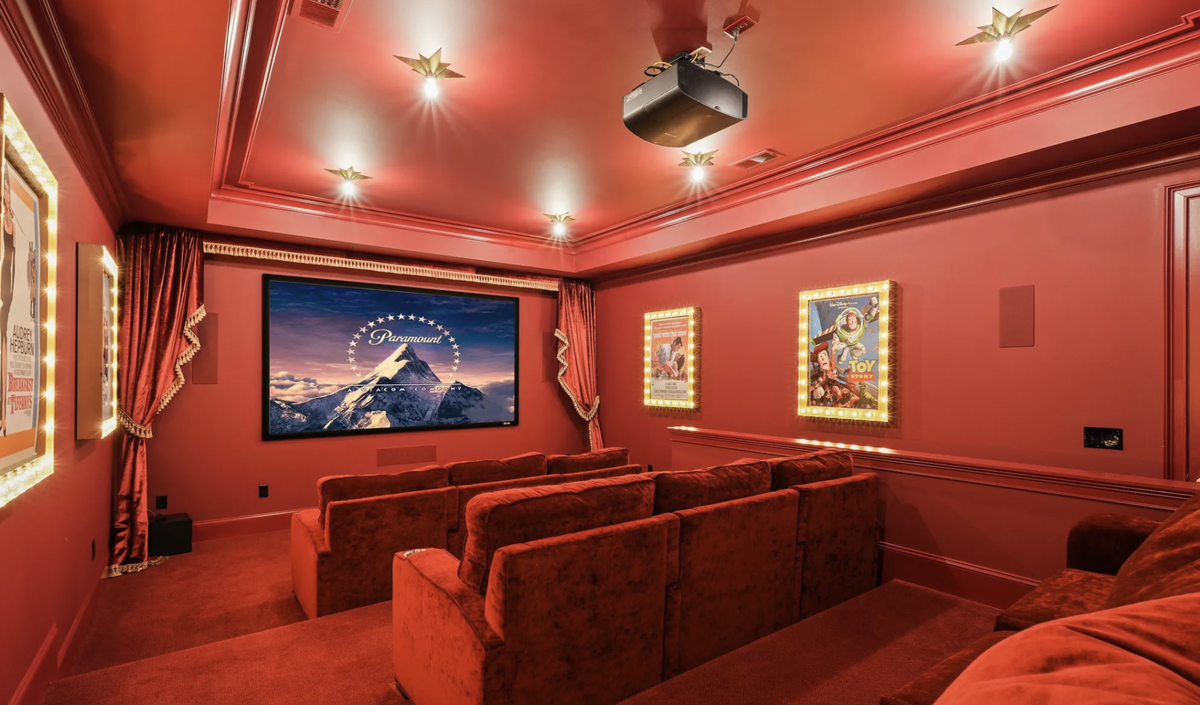A home theater seats at least nine people.