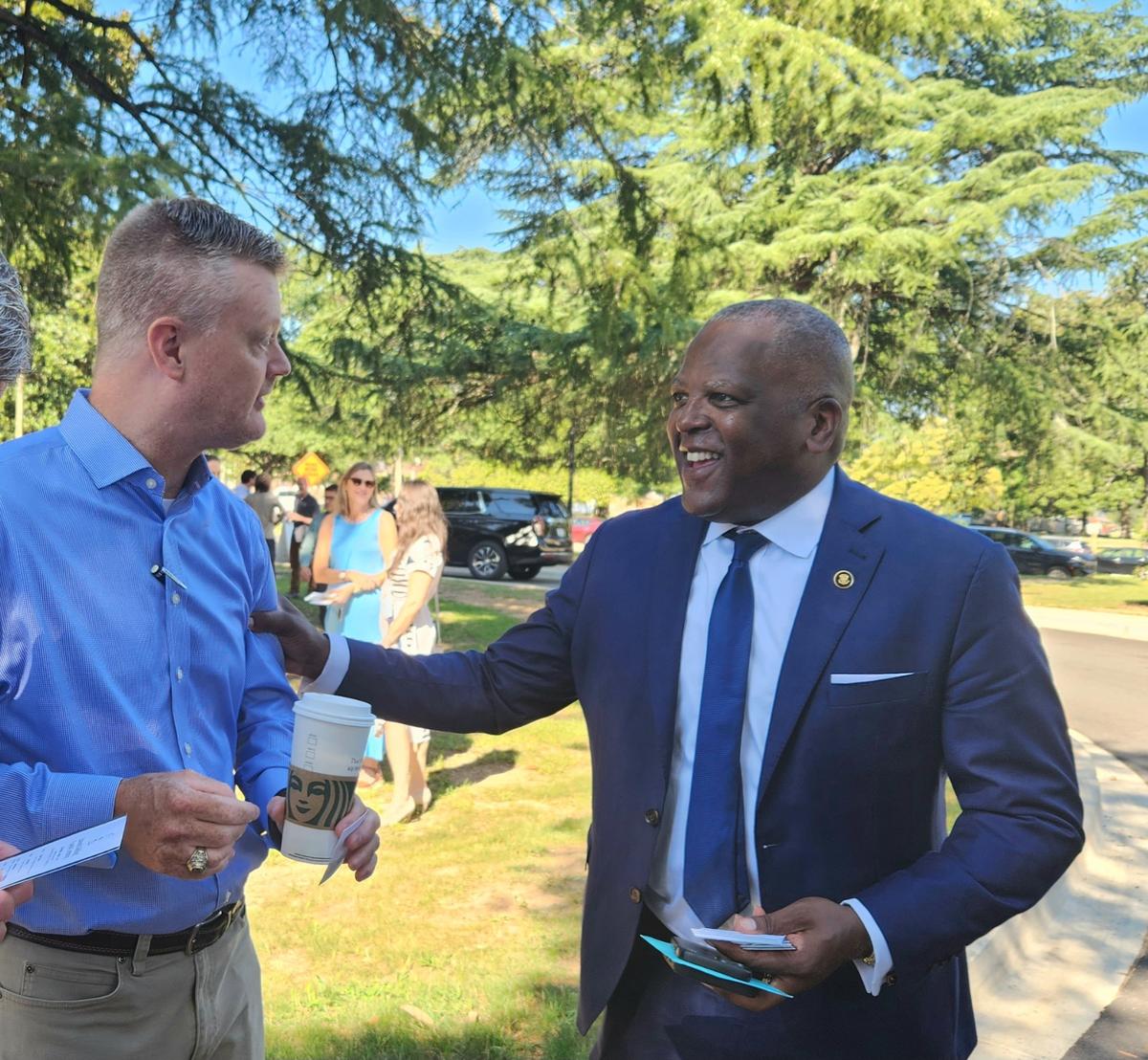 Former Columbia Mayor Steve Benjamin, right, chats with Assistant City Manager Clint Shealy on Aug. 9, 2023.