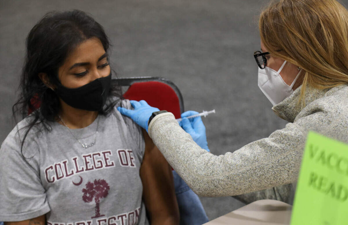 Monica Taylor administers a Coronavirus vaccination to Barsha Ray during a vaccination clinic for hospitality workers. The South Carolina Restaurant and Lodging Association partnered with Loveless Family Medicine to provide about 400 vaccines at the Columbia Convention Center.