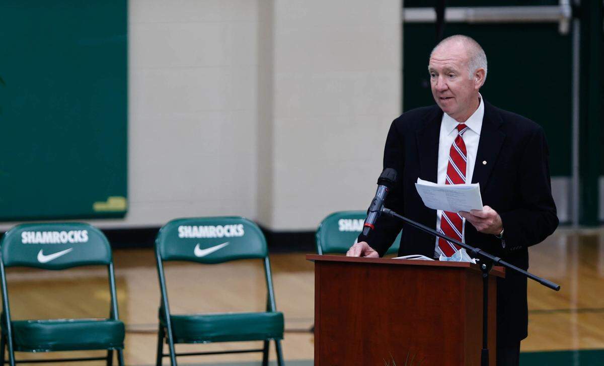 Former University of South Carolina basketball coach George Felton speaks about coach George Glymph during funeral services Dec. 22 for Glymph in the George E. Glymph Arena At Eau Claire High School. The Columbia native coached for 32 years, leading Eau Claire to five state titles between 1974 and 1996.
