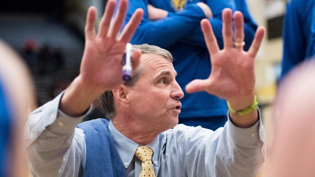 Lexington head coach Bailey Harris communicates with his his team during a time out during a game against Irmo on Dec. 18, 2018, in Irmo, S.C.