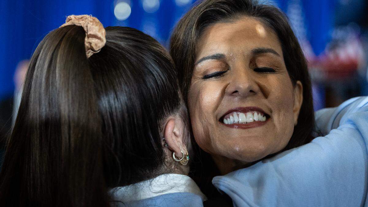 Former U.S. Ambassador and S.C. Gov. Nikki Haley hugs a supporter Saturday night at her election watch party at a hotel in Charleston, S.C.