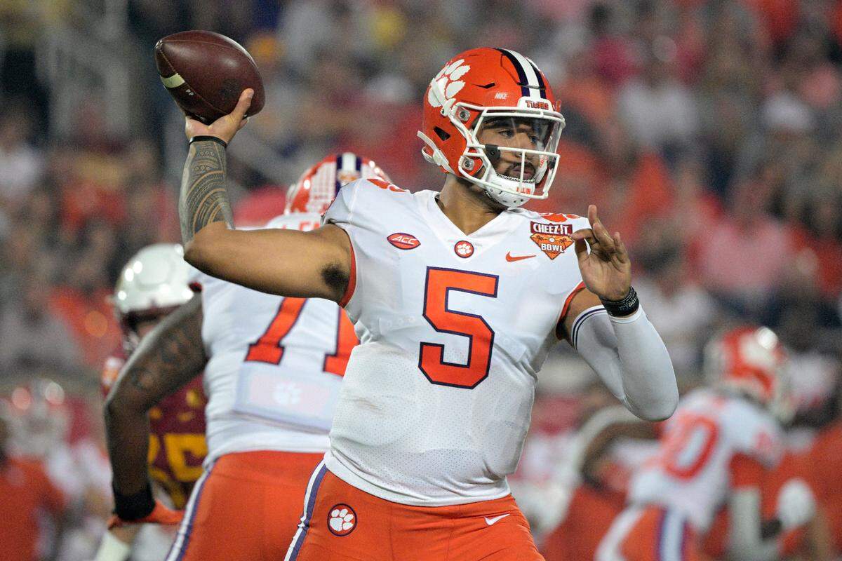 Clemson quarterback D.J. Uiagalelei (5) throws a pass during the first half of the Cheez-It Bowl NCAA college football game against Iowa State, Wednesday, Dec. 29, 2021, in Orlando, Fla. (AP Photo/Phelan M. Ebenhack)