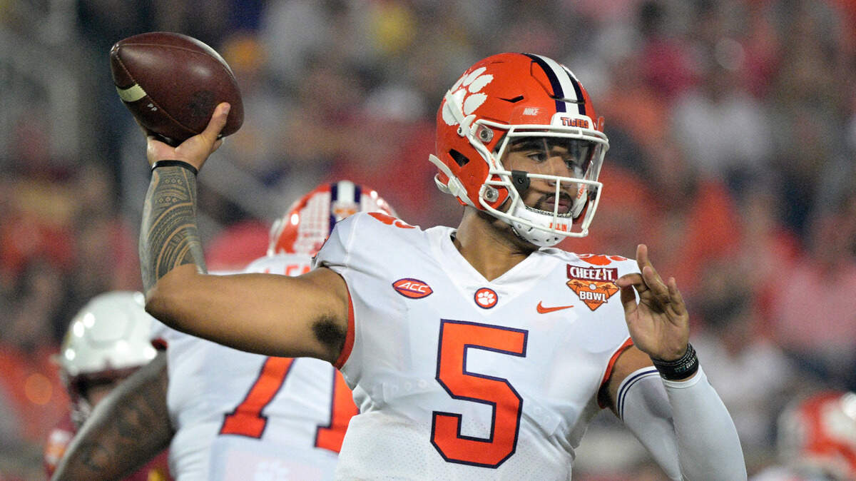 Clemson quarterback D.J. Uiagalelei (5) throws a pass during the first half of the Cheez-It Bowl NCAA college football game against Iowa State, Wednesday, Dec. 29, 2021, in Orlando, Fla. (AP Photo/Phelan M. Ebenhack)