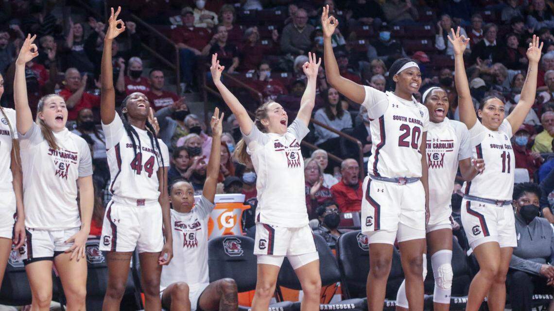 The University of South Carolina Gamecocks celebrate a three-point shot during the second half of action against Kansas State on Friday, Dec. 3, 2021 in the Colonial Life Arena.