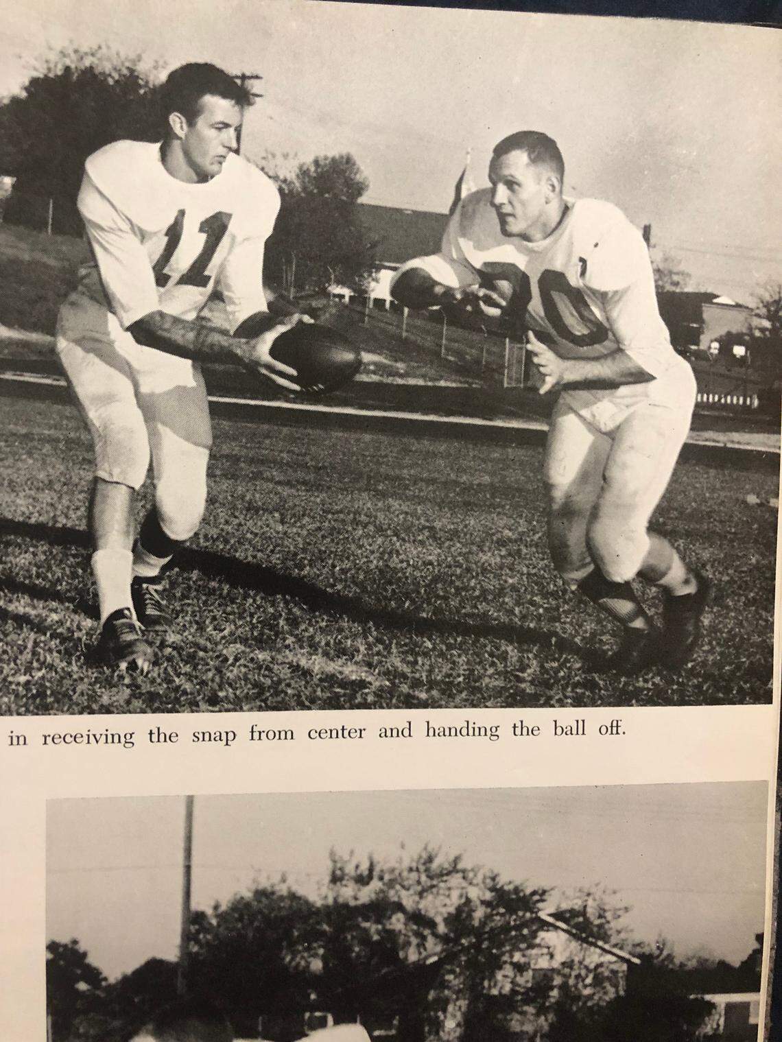 South Carolina halfback King Dixon (right) takes a handoff from quarterback Bobby Bunch