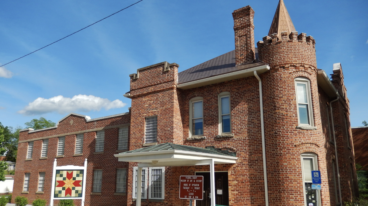 Once the Pickens County Jail, the building now houses the Pickens County Museum.
