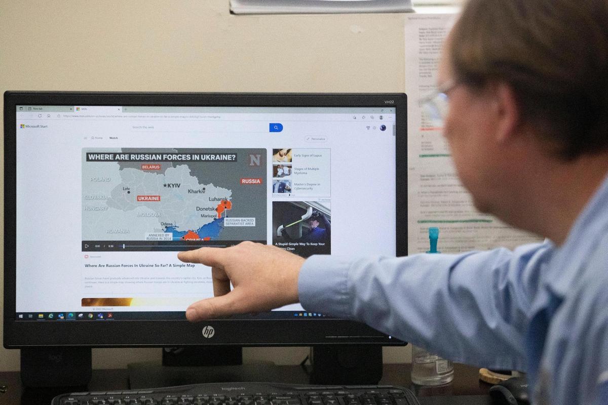 Yuriy Petrenko shows where his father lives in Ukraine at R&J Trucking in Gaston, South Carolina on Wednesday, March 2, 2022. Petrenko says he checks Russian troop movements every morning when he wakes up.