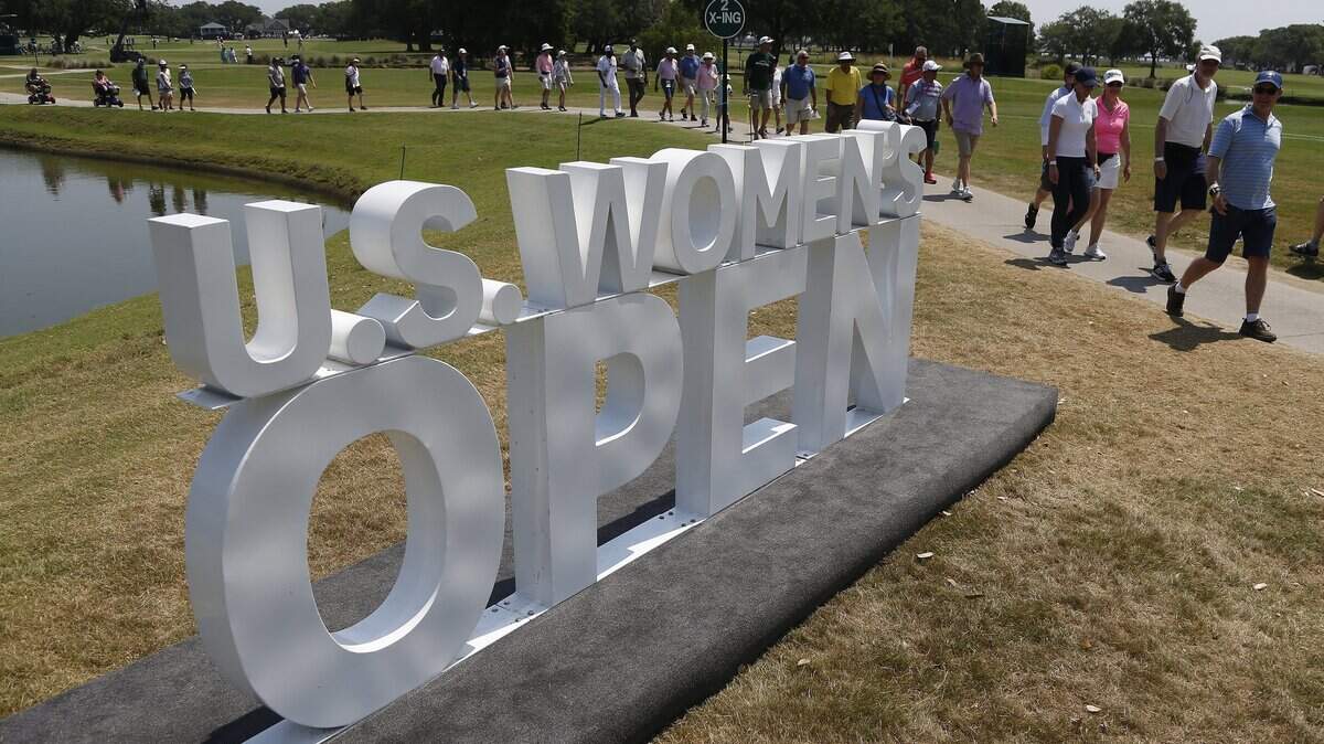 Spectators walk on the Country Club of Charleston golf course during the first round of the U.S. Women’s Open golf tournament, Thursday, May 30, 2019, in Charleston, S.C. (AP Photo/Steve Helber)