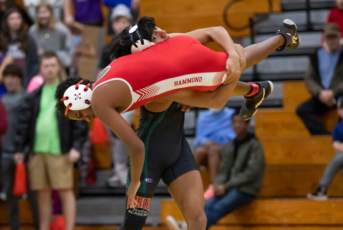 Reese Carson of Ben Lippen throws down Angesom Ladd of the Hammond School during the SCISA 2022 Duals State Wrestling Tournament at Ben Lippen on Saturday, February 5, 2022.