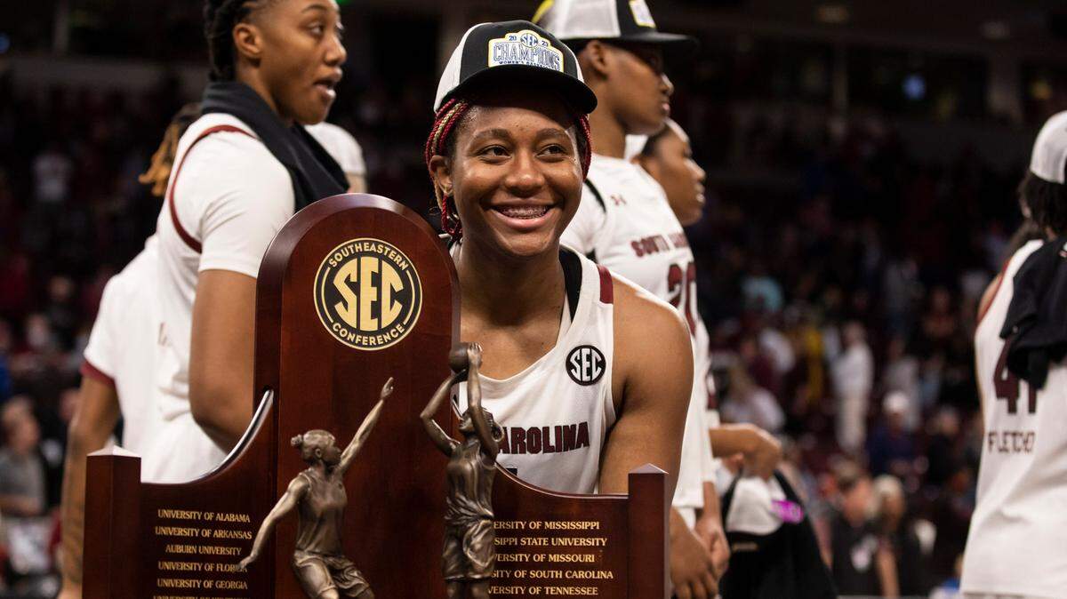 South Carolina Gamecocks forward Aliyah Boston (4) poses with the SEC trophy following South Carolina’s game against the visiting Bulldogs at Colonial Life Arena in Columbia on Sunday, February 26, 2023.